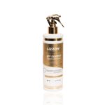 Um frasco dourado e branco de 500 ml de pH Control Estabilizador Neutralizante com um bico de spray é mostrado em um fundo branco.