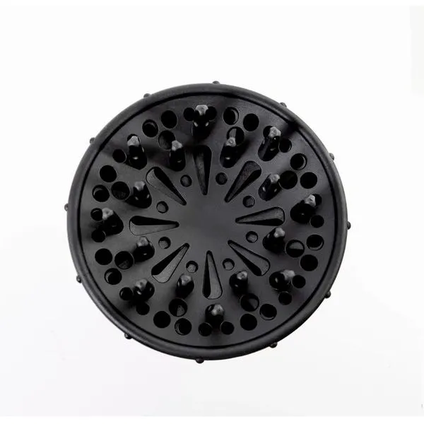Um difusor Difusor Extreme, preto e redondo, é mostrado visto de cima contra um fundo branco. Esse acessório difusor para secador de cabelo possui vários orifícios e pontas salientes, projetado para distribuir o fluxo de ar uniformemente na modelagem de cabelos cacheados ou ondulados.