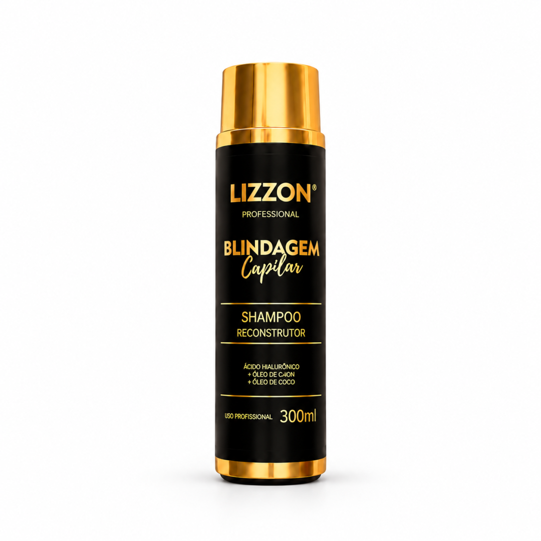 Um frasco cilíndrico preto de Shampoo Blindagem Capilar (para uso doméstico) de 250 ml, com tampa e base douradas, apresentando a inscrição em dourado Blindagem Capilar e Shampoo Reconstrutor.