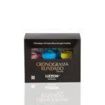 Uma caixa preta do Kit Cronograma Blindado contém três frascos - rosa, azul e amarelo - cada um enfatizando a hidratação, a nutrição e a reconstrução imediata.