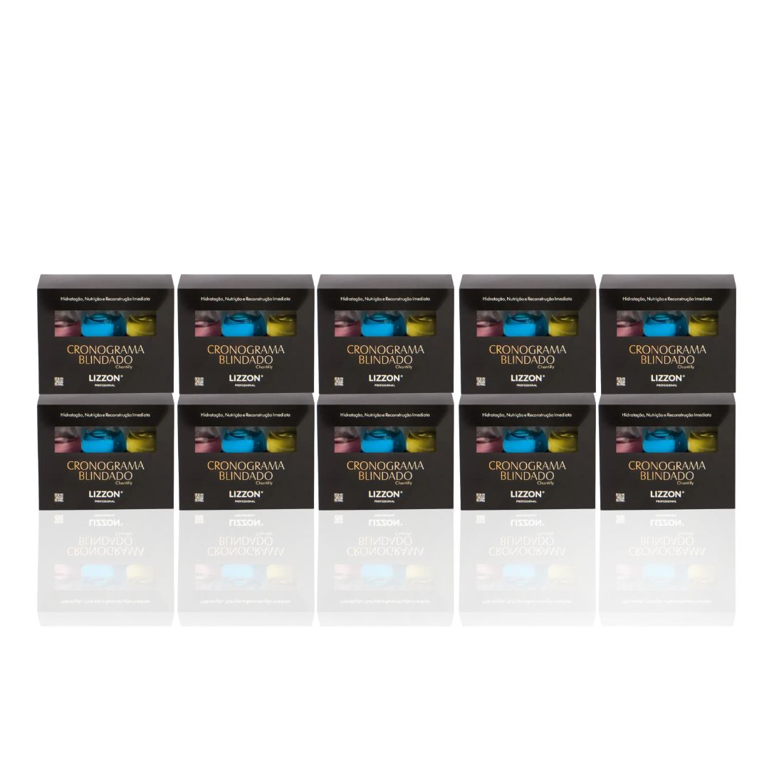 Dez caixas pretas idênticas rotuladas como Kit Cronograma Blindado (Combo 10 unidades) estão dispostas em duas fileiras em uma superfície branca, com seis caixas na parte de trás e quatro na frente, todas refletindo abaixo.