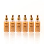 Seis frascos de Finish Glow - Perfume e Spray de Brilho (Combo 6 unidades) com bombas douradas estão dispostos em uma fileira em uma superfície refletora branca contra um fundo branco.