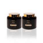 Dois potes pretos com tampas douradas rotulados como "Máscara Pre Liss 1kg (2 unidades)" são colocados lado a lado em um fundo branco, ambos com rótulos idênticos e um reflexo sutil embaixo.